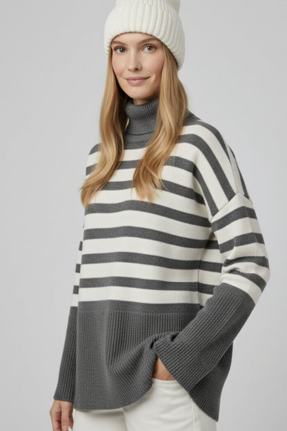 Gray oversized turtleneck sweater with white stripes and splits on the side