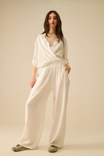 Lightweight wide-legged white pants with strass details