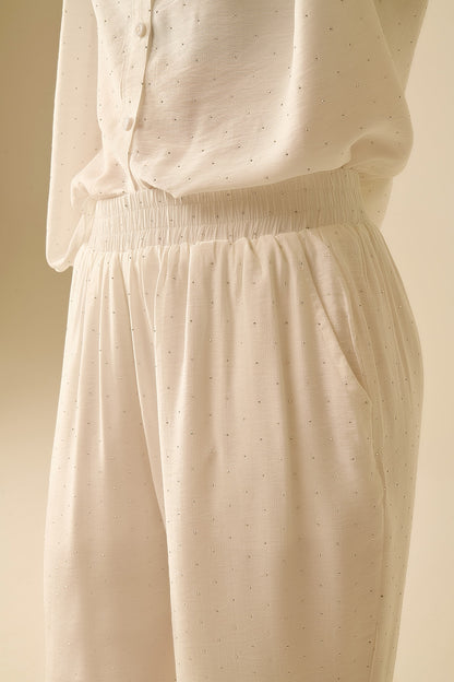 Lightweight wide-legged white pants with strass details