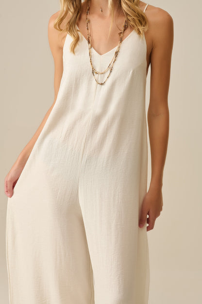Long Textured Jumpsuit with Beaded Straps in Cream