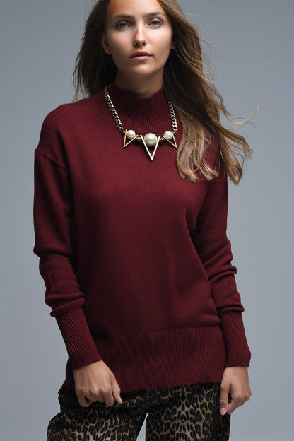 Loose burgundy sweater with open back detail