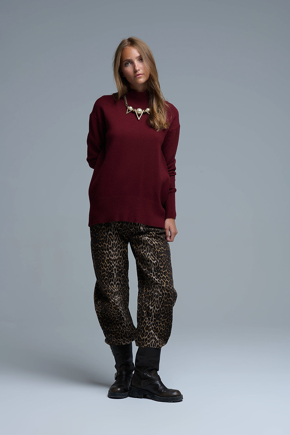 Loose burgundy sweater with open back detail