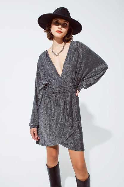 Mini length glitter dress with deep V neck in silver
