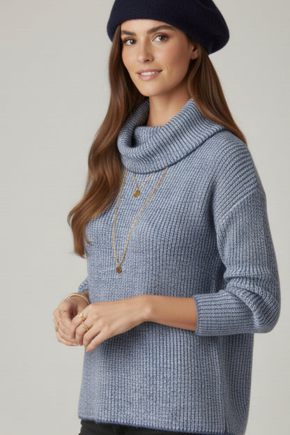 Navy blue ribbed knit sweater with a roll neck