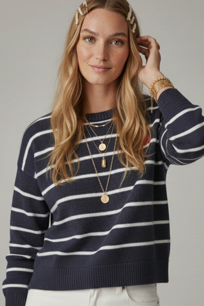 Navy striped knit sweater with red heart detail