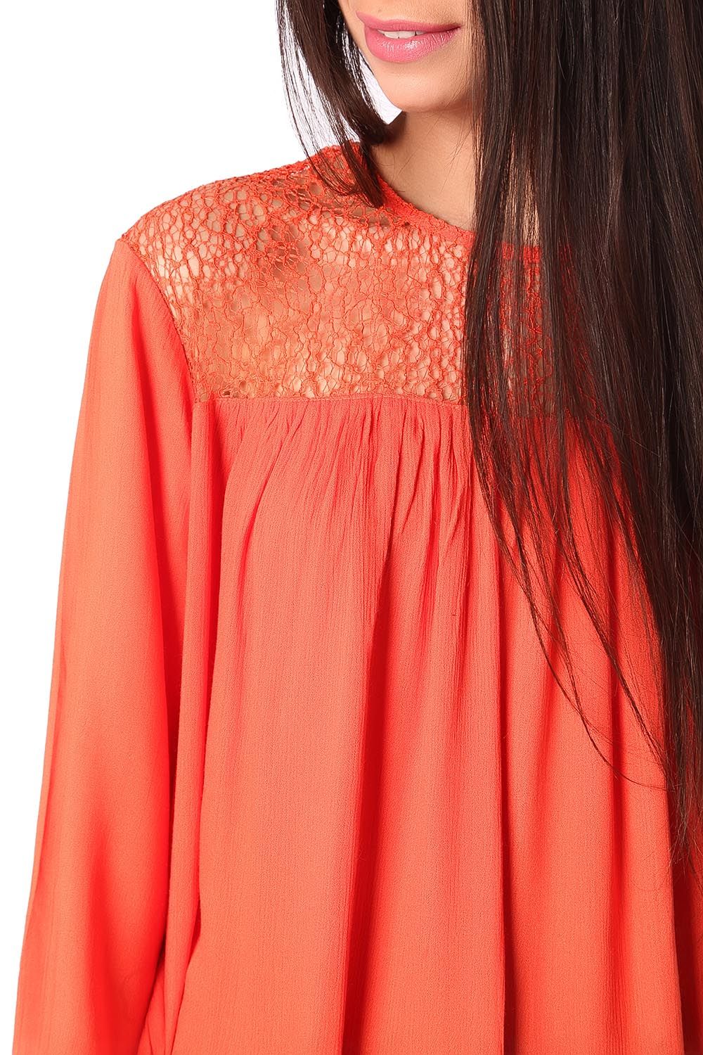 Orange smock blouse with cage detail