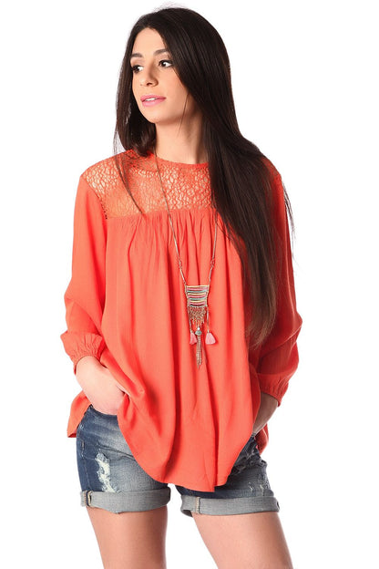Q2 Orange smock blouse with cage detail