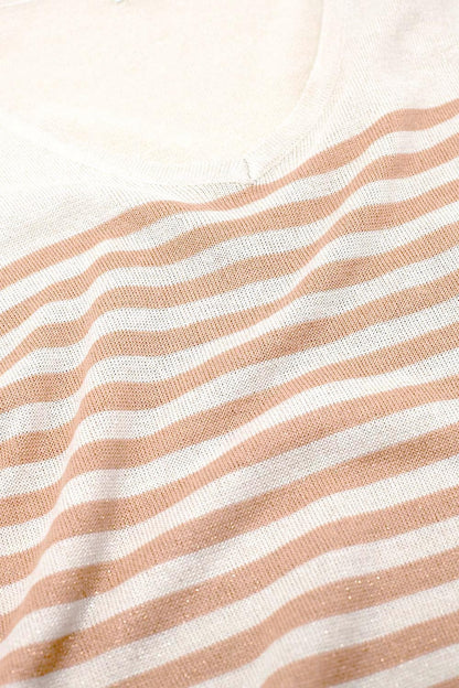 Oversized beige sweater with brown stripes and V-neck