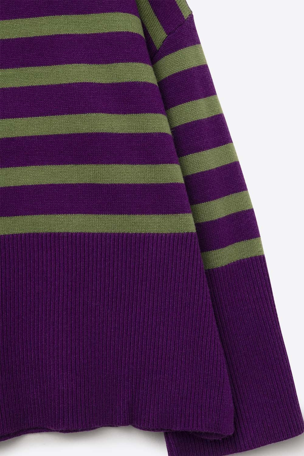 Purple oversized turtleneck sweater with green stripes and splits on the side