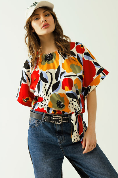 Relaxed white blouse with poppies designs and short sleeves