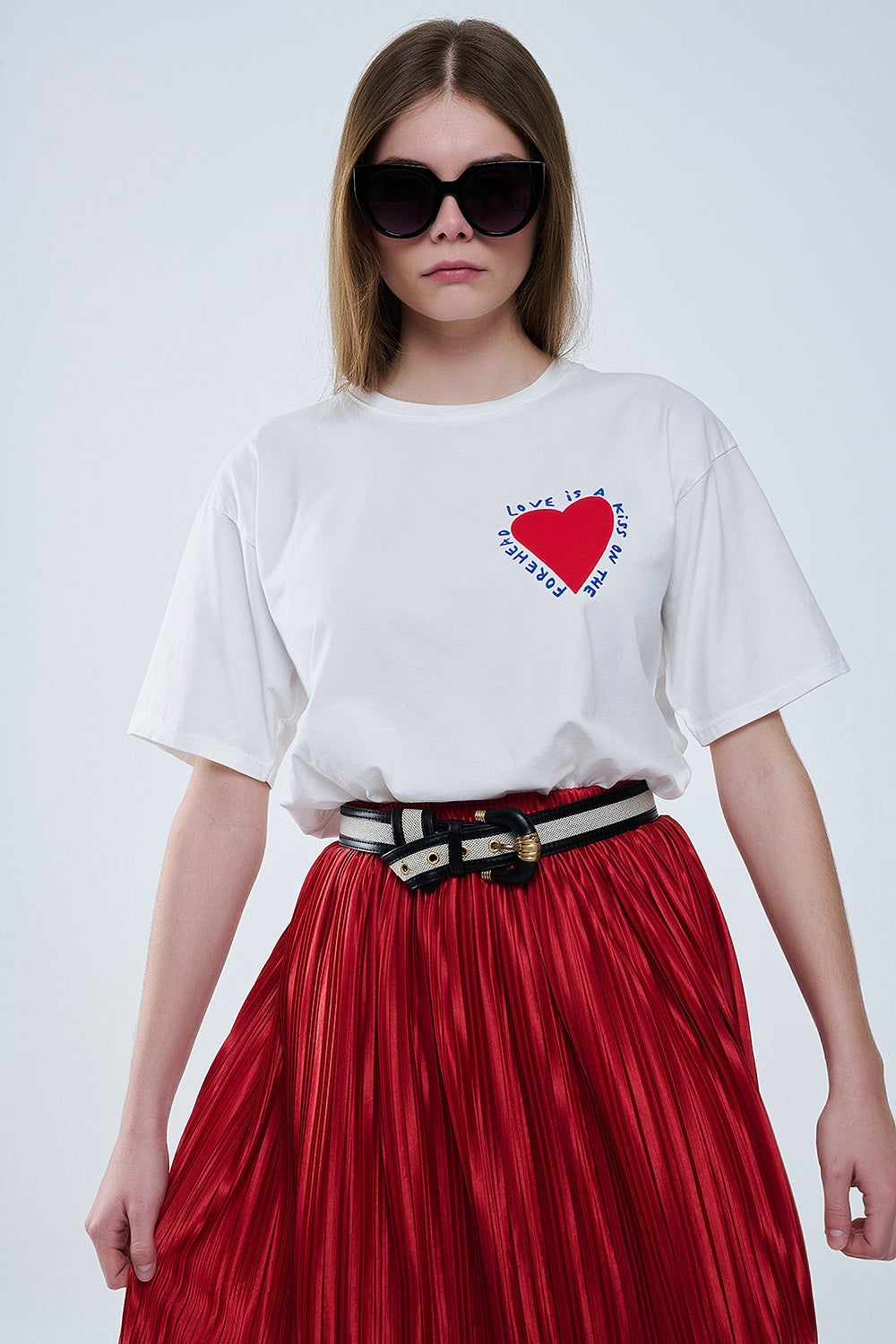 Relaxed white T-shirt featuring a heart design on both the front and back