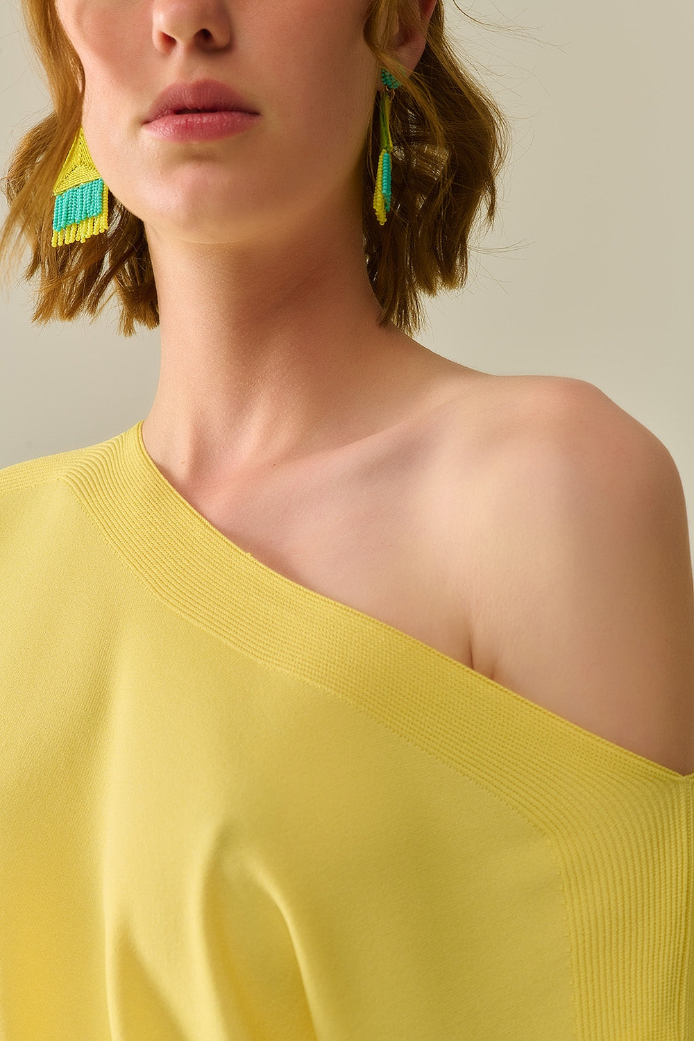 Relaxed yellow boatneck sweater with dropped sleeves