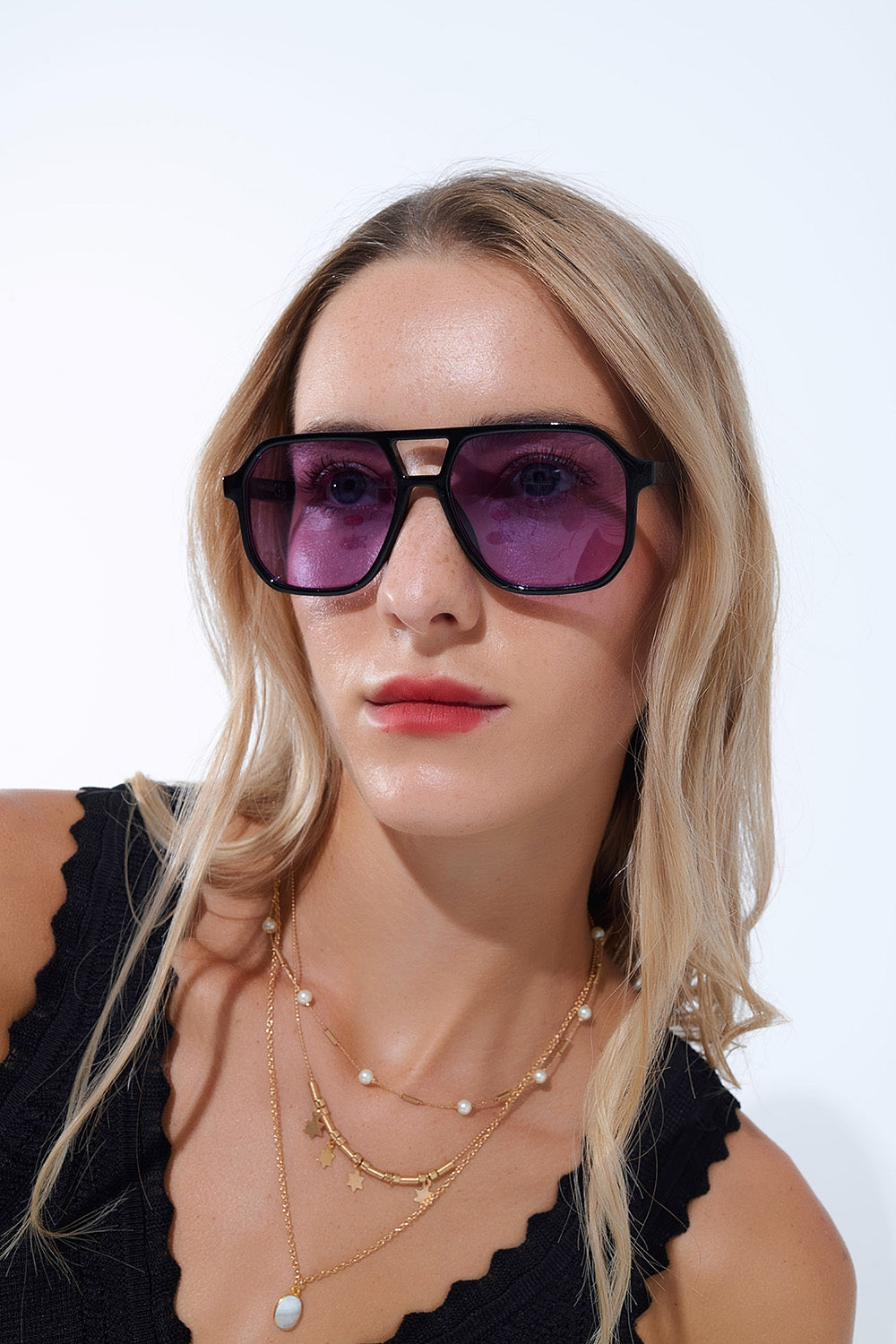 Q2 Retro Style Sunglasses with black frames and purple lenses