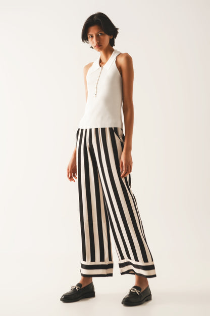 Ribbed knitted top with polo neck in cream