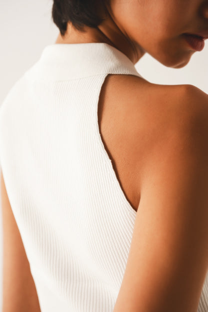 Ribbed knitted top with polo neck in cream