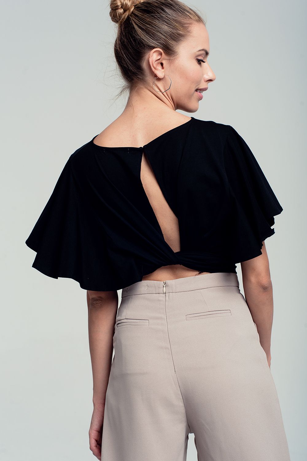 Ruffled sleeves black crop top with open back and bow detail