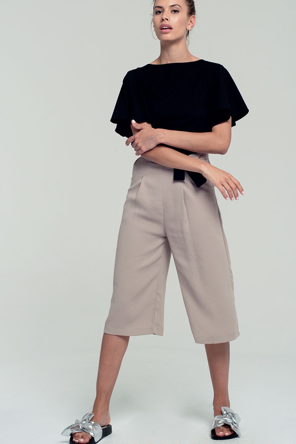 Ruffled sleeves black crop top with open back and bow detail