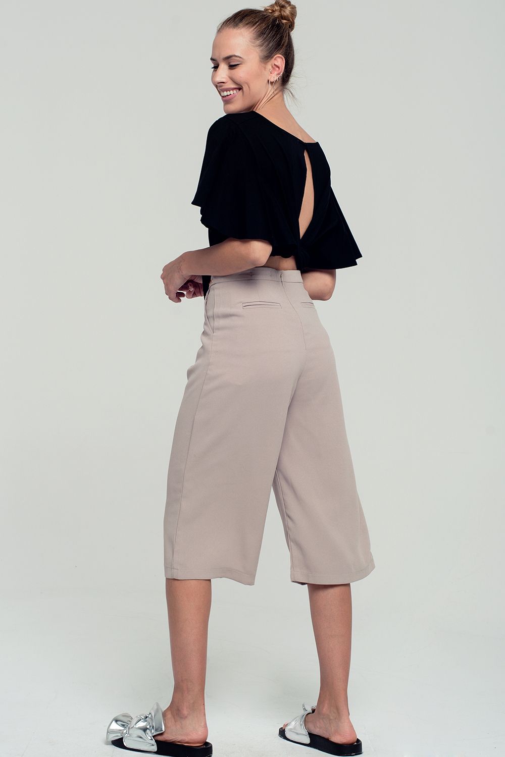 Ruffled sleeves black crop top with open back and bow detail