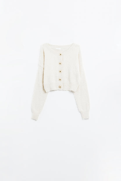 Short and fluffy cream cardigan with flower buttons
