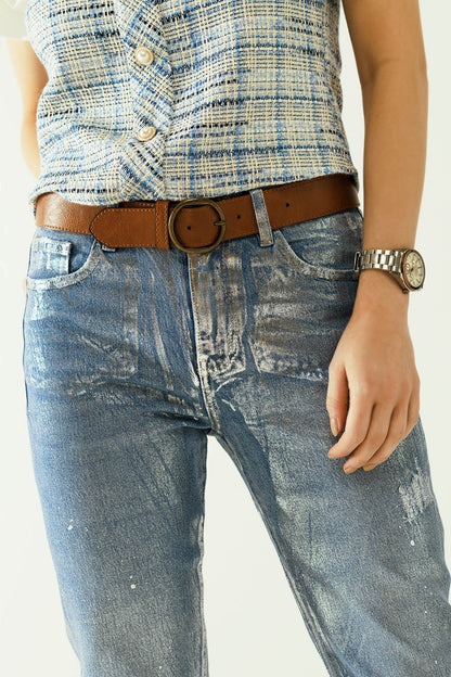 skinny blue jeans with metallic finish in light wash