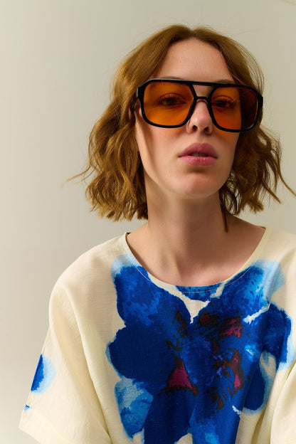 Sunglasses with black frames and orange lenses