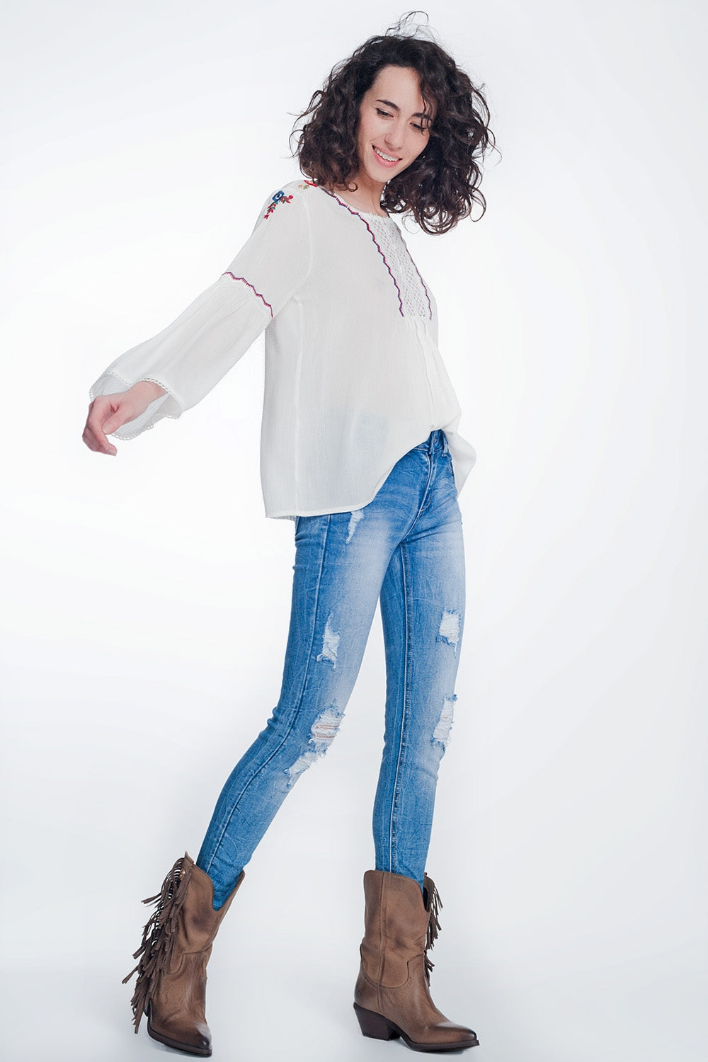 super skinny jeans in vintage mid wash blue with heavy rips
