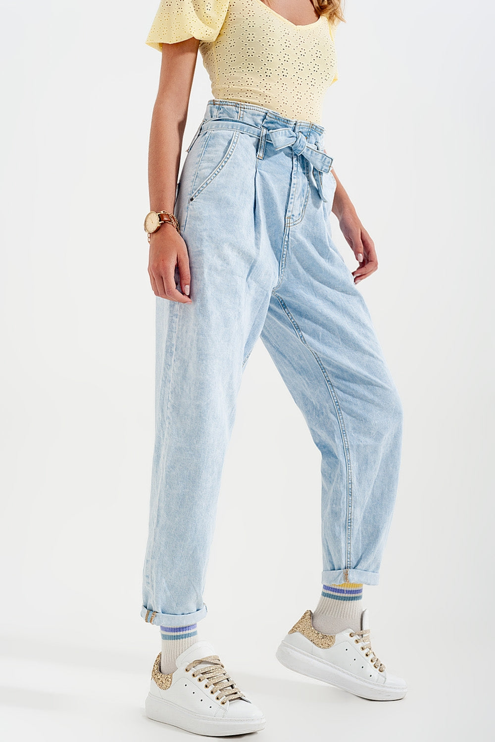 Tapered leg jeans with paper bag waist in light vintage wash