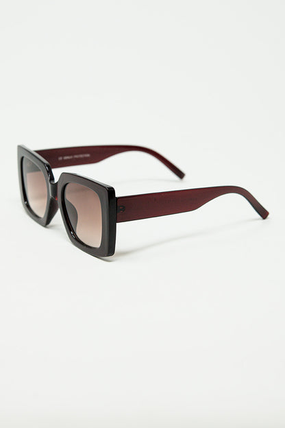 vintage silhouette sunglasses with a subtle angled cat-eye in burgundy