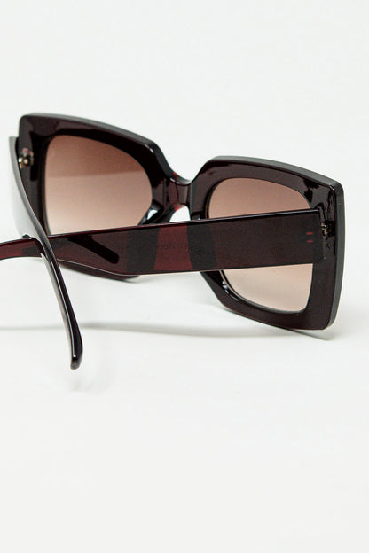 vintage silhouette sunglasses with a subtle angled cat-eye in burgundy
