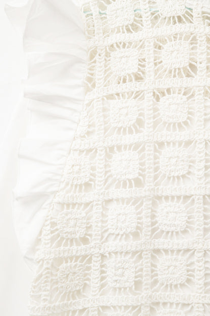 white Crochet Top with Ruffle Trim and long sleeves
