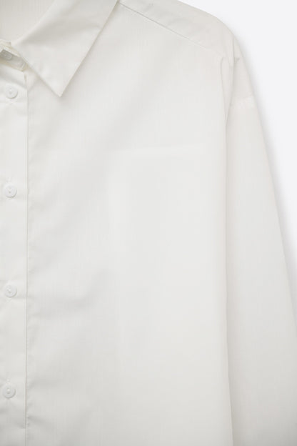 white poplin shirt with extra-wide cuffs
