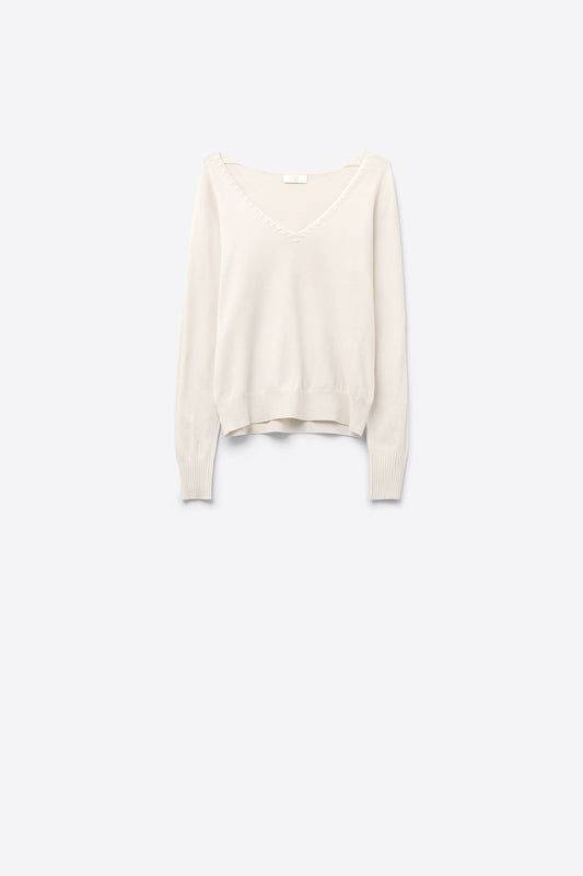 Q2 White  sweater with V neckline