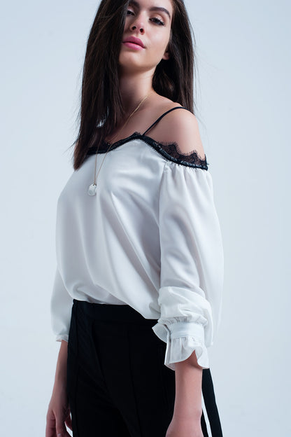 White top with black lace and bare shoulders