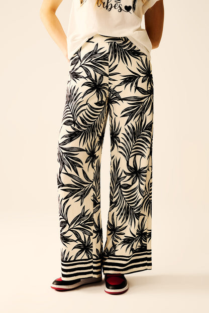 Wide Leg Pants In White With Floral Detail In Black